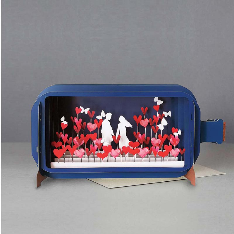 Message in a Bottle - Couple in field of Hearts and Butterflies Pop-Up Card