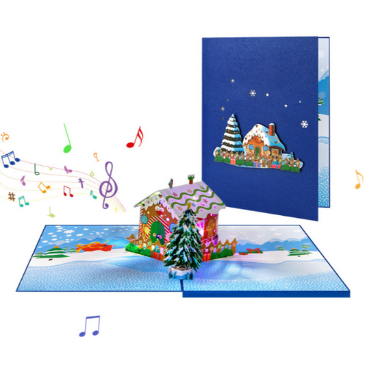 Pop-up Christmas card with gingerbread houses and snowy landscape